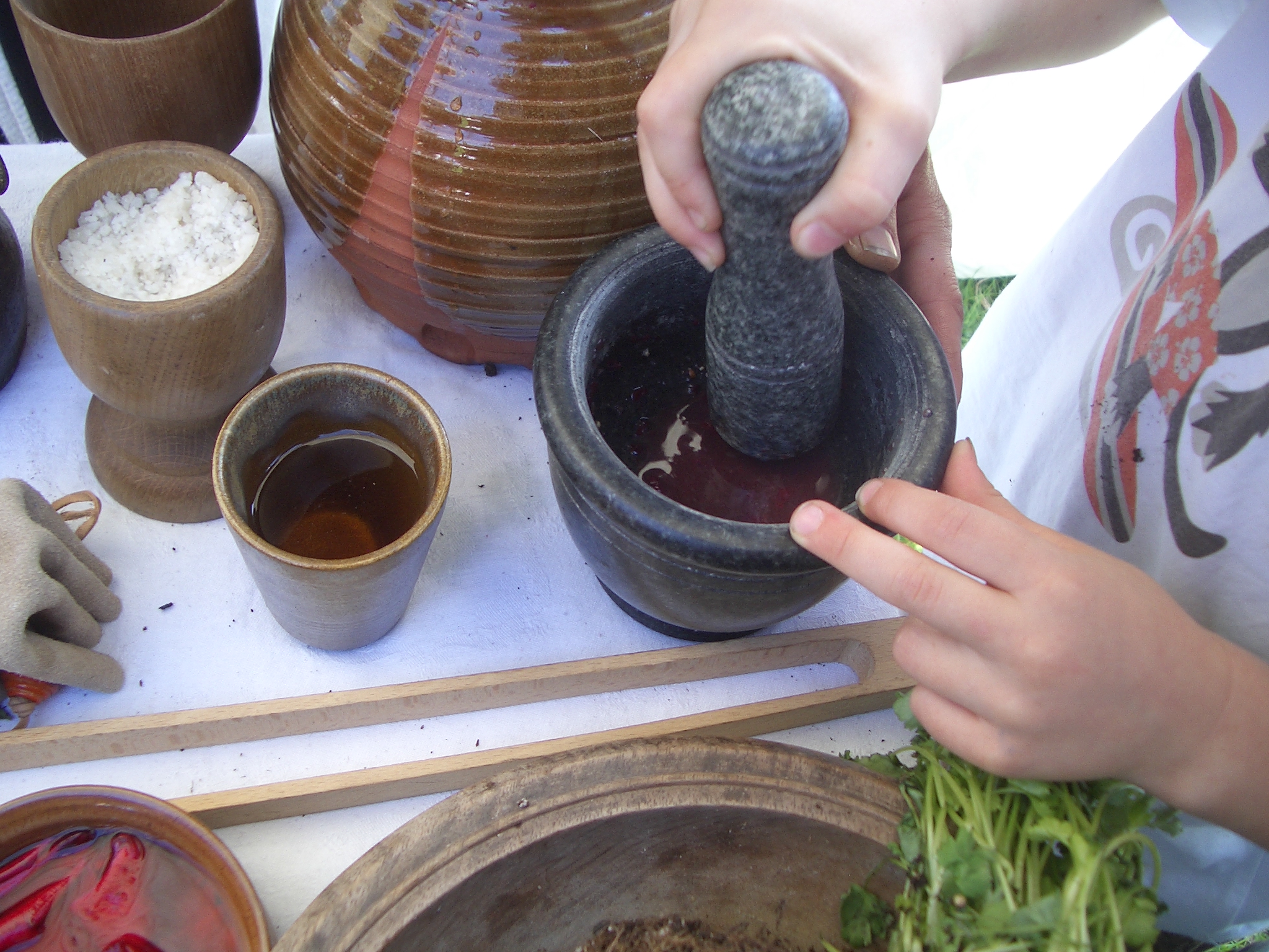 And tried their hand at grinding with a pestle and mortar