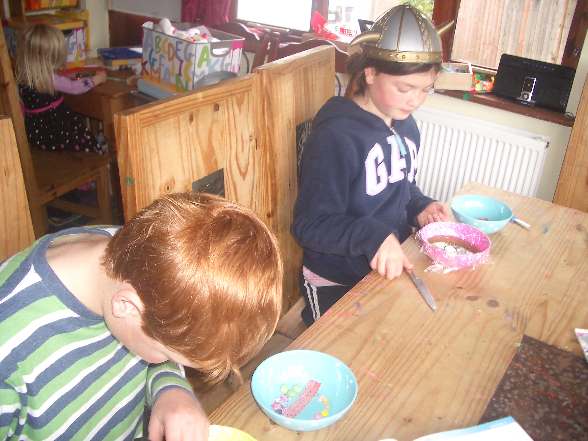 girl and boy making an edible cell